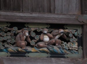 Three wise monkeys carving