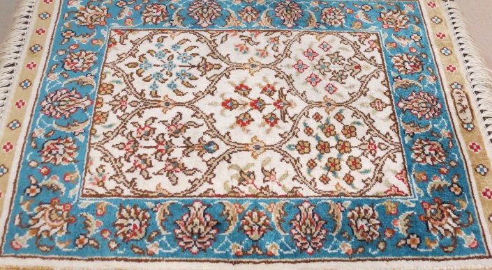 The front of our rug. Note the different shades of blue... this is NOT due to lighting. This is how silk looks from different angles