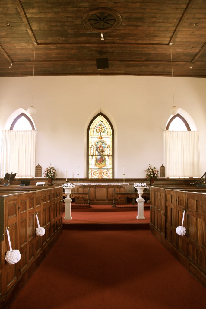 Down the aisle, note the family boxes on either side